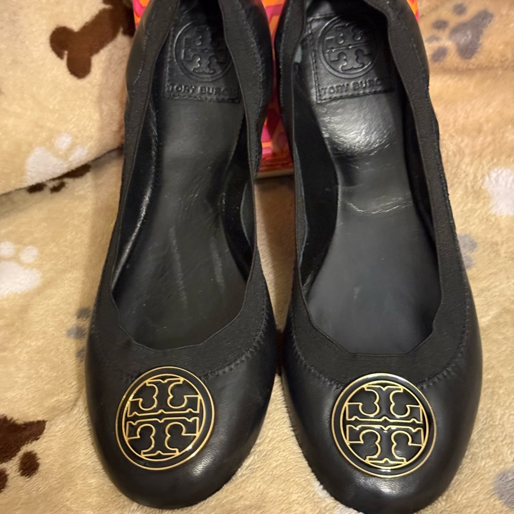 Tory Burch Black Flats with Gold Emblem
